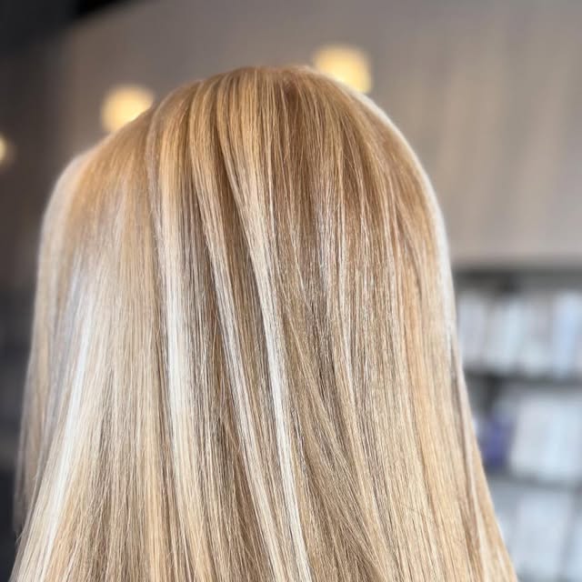 Long, smooth multi-tonal blonde hair seen from behind